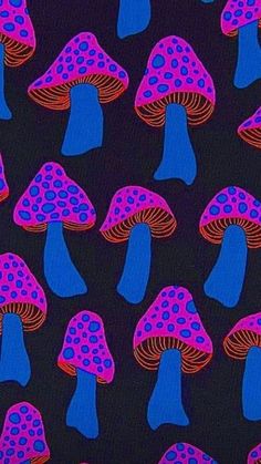 a group of colorful mushrooms on a black background with pink and blue dots in the middle