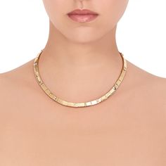 This gleaming diamond collar necklace is a versatile and captivating piece in 18K yellow gold and looks as striking in a formal setting as it does in a more casual setting worn with a white button-down shirt. Detailed with bold, rectangular baguette diamonds, this elegant necklace feels modern and luxurious simultaneously. The sleek edges and flat surface of this statement necklace allows for light to shine electrically off the solid gold surface, bathing your face in a lovely soft glow. Luxury Diamond White Rectangular Necklaces, Luxury Gold Rectangular Necklaces, Luxury Baguette Cut Yellow Gold Diamond Necklace, Luxury Gold Necklaces With Baguette Diamonds, Minimalist Gold Jewelry, Diamond Collar, Double Heart Ring, Gold Minimalist Jewelry, Necklace With Diamonds