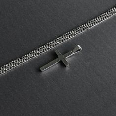 "*Waterproof Cross Necklace *Cross Necklace for men is Highly polished shiny both sides surface simple and classic design pendant with 3mm Cuban Link chain. *Silver Cross Necklace for men, cross pendant with chain High Quality 316L Stainless Steel is Commonly used for jewelry because it will not oxidize or turn black with only minimal maintenance. *Cross Pendant size : Length - 1.26\"(32mm), Width - 0.7\"(17mm). *Cross Chain size : Length - 16\", 18\", 20\", 22\", 24\", 26\", 28\", 30\" Width - Silver Curb Chain Jewelry For Father's Day, Father's Day Silver Curb Chain Jewelry, Silver Cross Necklace With Curb Chain For Gift, Silver Curb Chain Necklace With Cross Pendant, Stainless Steel Cross Necklace With Curb Chain, Boys Cross Necklace, Men Cross Necklace, Chain Cross Necklace, Cross Necklace For Men