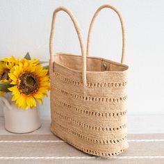 IN STOCK FAST SHIPPING FROM LOS ANGELES Chic large straw woven tote bag perfect for all occasions. This tote bag is sure to keep up with your busy lifestyle, providing a lightweight and durable design with a classic aesthetic. It’s the perfect way to stay organized while making a stylish statement. Natural Soft Raffia Straw Open top with magnetic button closureFully linedPocket insideMaterial: 100% RaffiaSize approximately 11"H x 15"W x 5.5"D7" handle drop Designer Style ID: 8607 Large Straw Wov Eco-friendly Straw Bag With Braided Handles For Shopping, Everyday Basket Bucket Bag With Open Weave, Natural Fiber Straw Bag With Rolled Handles For Shopping, Large Capacity Crochet Bag For Shopping, Shopping Straw Bag With Rolled Handles, Large Capacity Crochet Shopping Bag, Rectangular Straw Bag With Open Weave For Everyday Use, Beige Straw Shopping Bag With Rolled Handles, Bucket Beach Bag With Open Weave For Shopping