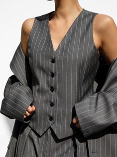 A tailored pin striped suit vest with button details. Stylish silhouette. Model is in MINUSEY S. ✔️ Free worldwide express shipping over $100✔️ Loved by 6,500+ customers✔️ Limited edition collections, maximum styleStay ahead of the trend with can’t-find-anywhere-else staples. Your closet will thank you 💕* MINUSEY S = EU 34, US 2* MINUSEY M = EU 36, US 4* 70% Polyester / 30% Rayon* Dry clean* Made in Korea - Model Height: 172cm/5'7" (US 2, EU 34) Striped Suit, Black Pins, Future Style, Pin Stripe, Mermaid Skirt, Denim Bag, Suit Vest, Leather Dresses, Sweater Blouse