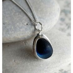 "A rare piece of multi blue coloured seaglass found on the Durham Heritage Coast. This Seaham blue multi is encased in a handmade  eco silver bezel and on a 18\" silver chain. The last bottle works closed in 1921at Seaham where glass was discarded into the North Sea. This beautiful treasure has been smoothed and shaped naturally by mother nature for a hundred years. A truly one off special piece of jewellery." Elegant Blue Sea Glass Jewelry, Blue Teardrop Sea Glass Jewelry, Blue Sea Glass Jewelry Gift, Blue Sea Glass Jewelry As A Gift, Blue Teardrop Recycled Glass Jewelry, Blue Sea Glass Necklaces For Jewelry Making, Blue Recycled Glass Nickel-free Necklace, Blue Recycled Glass Pendant Necklace, Blue Nickel Free Necklace With Recycled Glass