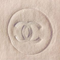 an image of a logo in the middle of a paper sheet that is made to look like a circle