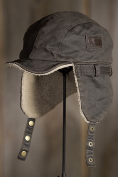 Our Weathered Cotton Winter Cap is crafted with a rugged look, offers an insulating Sherpa lining and earflaps for versatility. Free shipping + returns. Grunge Hats, Adventure Hats, Dieselpunk Fashion, Winter Accesories, Aviator Cap, Aviator Hat, Trapper Hat, Trapper Hats, Hat Ideas