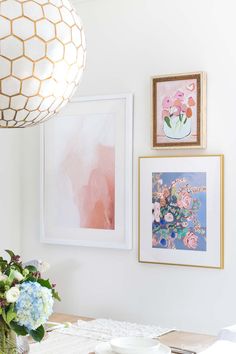 asymmetrical trio gallery wall above breakfast nook Breakfast Nook Artwork, Breakfast Nook Gallery Wall, Three Pictures On Wall, Boston Apartment Aesthetic, Wall Picture Collage Ideas, Wall Picture Collage, Picture Collage Ideas