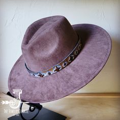 If you’re looking for the perfect accessory to complement your favorite boho style, look no further. The Boho-Style Western Felt Hat w/ Embossed Leather Hat Band by The Jewelry Junkie is absolutely everything that you need. Not only is it easy to incorporate into any and all outfits, but the genuine leather of the band immediately elevates whatever it is you’re wearing. Match your one-of-a-kind hat with any one of the matching accessories that we have for a completely gorgeous look. One Size Hat with adjustable inner hat liner (see last photos) 1 inch wide Hat Band Embossed Leather Hide Genuine Leather Band is Sourced and Hand-Made in Texas Boho Style Western Felt Hat-choice of color Wide Flat Brim Adjustable Leather Ties come on every Leather Hatband (see last photos) The item that you re Brown Bohemian Hats For Country Events, Bohemian Brown Hats For Country Events, Adjustable Brown Bohemian Hat, Bohemian Wide Brim Fedora, Bohemian Brown Hat Bands For Country Events, Hippie Wide Brim Fedora For Festivals, Bohemian Brown Hat Bands For Fall, Bohemian Flat Brim Felt Hat For Ranch, Bohemian Brimmed Felt Hat For Ranch