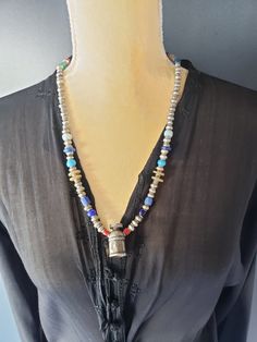 "Beautiful Handmade Tribal rare Ethiopian Silver Beads necklace with old Pendant and glass Beads IN Venetian African Trade Bead an silver beads. from 1930s This is a very one of a kind necklace a museum piece I got it over 20 years ago decided to sell it out of my collection Length 22\" Pendant 1''.5 x 22mm in Beads size from 16mm to 11mm and 5mm The Necklace is also a pre-owned old vintage item which may reflect signs of usage and wear. The beads are in very good condition very collectible and