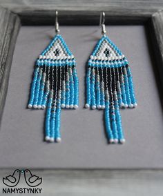 These azure fringe beaded earrings are made of high-quality Czech beads and strong synthetic thread. They are elegant, fashionable, and highly versatile, suitable for everyday wear. Features: Sterling silver components Color: gray, blue, white Length (approximate): 10 cm (3.93 in) This item is currently in stock. You must be completely satisfied. If you find merchandise unsatisfactory for any reason, return it within 10 days and your money will be refunded without questions. More beaded earrings Blue Fringe Dangle Chandelier Earrings, Blue Fringe Beaded Drop Earrings, Blue Fringed Beaded Drop Earrings, Blue Fringe Drop Earrings, Blue Beaded Fringe Drop Earrings, Blue Tassel Drop Earrings With Dangling Beads, Blue Beaded Fringe Dangle Earrings, Blue Beaded Fringe Dangle Jewelry, Blue Dangle Earrings With Beaded Fringe