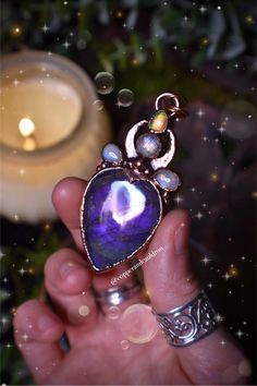 "Crafted with purple labradorite, moonstone, and rainbowy opal. The color combination of purple and white represent the moon and strong connection to Spirit and divinity. The chain is 18\", please send a message if you prefer another size!" Handmade Mystical Purple Necklace, Bohemian Purple Pendant Jewelry, Bohemian Purple Necklace With Large Pendant, Bohemian Purple Glass Necklace, Spiritual Purple Moon-shaped Jewelry, Divine Connections, Talisman Necklace, Purple Labradorite, Chic Boutique