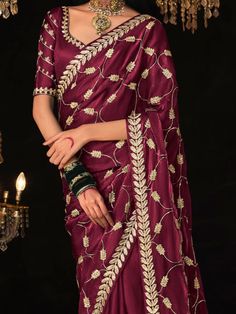 Add the breezy vibrancy of the season to your wardrobe with this captivating purple tissue silk saree. Its rich color, luxurious fabric, and exquisite embellishments make it an ideal choice for any special occasion. Made from high-quality tissue silk material, this saree features intricate sequin work, embroidery work, and tassels on the pallu, adding a luxurious and festive touch to your outfit. The saree comes with a matching color silk material blouse with thread embroidery work, complet Purple Raw Silk Cutdana Blouse Piece, Traditional Purple Chinon Blouse Piece, Purple Bollywood Blouse Piece In Dola Silk, Purple Chanderi Traditional Wear With Dori Work, Purple Chinon Saree Blouse Piece, Purple Blouse Piece With Resham Embroidery For Navratri, Designer Purple Blouse Piece With Resham Embroidery, Purple Saree Blouse Piece With Resham Embroidery, Semi-stitched Purple Blouse Piece For Eid