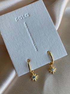 14K Gold plated 925 Sterling Silver Star hoop earrings. Minimalist style. Everyday jewelry made with love. DETAILS * 14K Gold Plated * 925 Sterling Silver * AAA Cubic Zirconia Stone * Lead Free and Nickel Free MEASURES Hoop Diameter: 16mm (1.6cm) Charm Size:10mm (1cm) PACKAGE: All jewelry comes in beautiful packaging, gift ready. ABOUT FALA All our work is made with love in Santa Monica, California. We love our customers and will make sure you're well taken care of. ENTER OUR SHOP HERE for more Star Hoop Earrings, Gold Star Earrings, We Love Our Customers, Earrings Star, Hoop Charms, Santa Monica California, Hoop Earrings Gold, Packaging Gift, Fabulous Jewelry