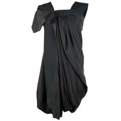 Product details: Black 100% silk asymmetrical style dress designed by Celine, featuring mini length and silver tone rear zip closure. Made in France. Black Silk Mini Dress, Celine Dress, Asymmetrical Style, Zip Front Dress, Vintage Mini Dresses, Fitted Maxi Dress, Black Leather Dresses, Black Knit Dress, Mini Dress Black