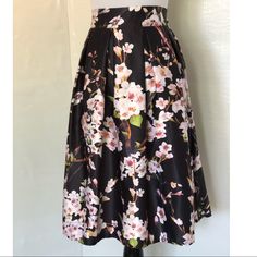 Brand New. Never Worn. Perfect Condition. Beautiful Floral Midi Skirt From Chicing. Size Small. Elastic Waist 13 Before Stretched. Length 25. Zipper On The Side. Black A-line Skirt For Spring, Black Floral Print Party Skirt, Floral Midi Skirt, Women Skirts Midi, On The Side, Midi Skirt, Elastic Waist, Womens Skirt, Elastic