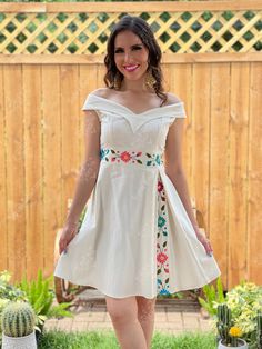 This Beautiful Dress boasts a Traditional Mexican floral design combined with a modern style dress. The embroidered floral design combined with the princess cut style makes it fun and flirty. It's made out of fine Mexican cotton and has elastic on the back for a tighter fit. This dress is handmade and hand embroidered by Mexican Artisans in Oaxaca, Mexico. This dress comes in one size: Small/Medium Purchase the earrings modeled here: https://www.etsy.com/es/listing/1058388801/filigrana-mexicana- Mexican Dama Dresses For Quince, Traditional Princess Dress, Mexican Dresses For Women, Mexican Party Dress, Mexican Bridesmaid Dresses, Princess Cut Dress, Lisa Clothes, Poncho With Sleeves, Red Linen Dress