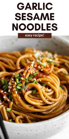 garlic sesame noodles in a white bowl with chopsticks on the side and text overlay