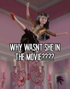 a woman standing on top of a chandelier with the caption, why was she in the movie??