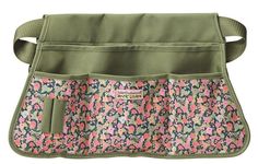 a green purse with pink and blue flowers on it