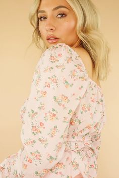 Turn heads in our Tati Floral Top. The feminine top is made from a lightweight blush fabric and floral print throughout. Pair the top with high waisted white denim for a brunch look. Floral Print Crop Top Ruffle Detailing Puff Sleeve 100% Polyester Hand Wash Cold Model is wearing a Small Blush Fabric, Floral Babydoll Top, Pink Floral Top, Floral Ruffle Top, Floral Print Crop Top, Feminine Top, Long Sleeve Floral Top, Donate To Charity, Top Floral