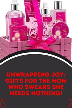 a pink gift box filled with lots of different types of soaps and lotions