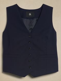 A tailored suit vest, this piece is crafted from our signature Siena Italian wool, selected for its all-weather weight and hint of stretch.  Semi-fitted Fabric sourced from Italy's Marzotto Mill.  V-neck with button-front closure.  Adjustable tabs at waist.  Front pockets.  Fully lined.  Semi-fitted.  Sleeveless.  Above-hip length.  Body length (size S): Regular 21" Model: Size S, 5'10" (178cm). Vest Navy, Tailored Suit, Wool Vest, Suit Vest, Siena, Own Style, Hip Length, Black And Navy, Banana Republic