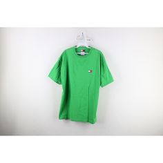 Vintage 90s Tommy Hilfiger Mens Medium Spell Out Box Logo Short Sleeve T-Shirt Mens T-Shirt Color fade Mens size Medium Measurements are: 22 inches underarm to underarm 29.5 inches top to bottom Green Cotton US Shipping is FREE Canada is $15 and International is $24 Check out my other items in my store! X326 Green 90s Style T-shirt For Summer, Retro Green T-shirt For Streetwear, 90s Style Short Sleeve Shirt With Logo Print, 90s Short Sleeve T-shirt With Logo Print, 90s Green T-shirt With Logo Print, 90s Style Green T-shirt With Logo Print, Green Retro T-shirt For Streetwear, Vintage Green T-shirt With Logo Print, Vintage Green Shirt For Streetwear