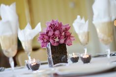 a table with flowers and chocolates on it