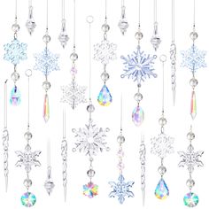 many different types of snowflakes hanging from chains