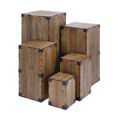 four wooden boxes stacked on top of each other