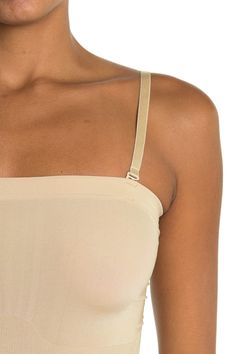 A seamless bodysuit adds shape and definition into any look. . Square neck. Strapless. Solid colorway. Seamless. Approx. 23" length (size S-M). Imported Hand wash 97% nylon, 8% spandex Solid Nylon Bodysuit With Built-in Bra, Beige Full Coverage Bodysuit With Built-in Bra, Stretch Nylon Bodysuit With Built-in Bra, Stretch Smoothing Strapless Bodysuit, Seamless Stretch Bodysuit With Spaghetti Straps, Strapless Stretch Smoothing Bodysuit, Strapless Smoothing Stretch Bodysuit, Beige Stretch Full Coverage Bodysuit, Elegant Seamless Beige Bodysuit