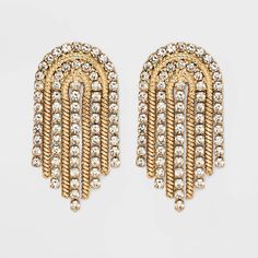 Add a little edge and sparkle to every ensemble with the SUGARFIX by BaubleBar Crystal and Gold Arch Statement Earrings. These statement earrings feature on trend curtain fringe crafted from gold hardware, and are dotted with dainty crystals for extra shine. With its unique shape and sleek movement, we're sure you'll wear this pair for many occasions. Disco Outfits, Gold Rhinestone Earrings, Pageant Outfits, Crystal Statement Earrings, Glowforge Projects, Beige Fashion, Baublebar Earrings, Curtain Fringe, Rhinestone Fringe