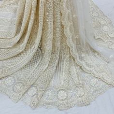 Wedding bridal  lehenga for women ready to wear chikankari lehenga with embroidered blouse and dupatta. * Plus size available at a small up-charge. * Size: This is custom made outfit as per your size. Post your order we will send you a measurements reference sheet using which you can provide details required to make your outfit with best fit. * Fabric and work: Lehenga - Heavy embroidery net fabric. Blouse - Embroidered  fabric. Dupatta - Embroidered net. * Delivery time: This lehenga set will take 2-3 weeks to produce after we have received your sizing details. Don't worry it can be made sooner too, just keep us informed, we will process it accordingly and deliver on or before a delivery date we discuss. *Rush Order : Please use shipping upgrade at checkout to enable expedite shipping opt Designer Lace Sharara Semi-stitched, Fitted Lace With Intricate Embroidery For Festive Season, Festive Fitted Lace With Intricate Embroidery, Designer Lace Lehenga For Diwali, Elegant Off White Choli With Chikankari Embroidery, Designer Lace Fitted Sharara, Elegant Semi-stitched Lace Lehenga, Designer Bollywood-style Lace Choli, Designer Bollywood Lace Choli