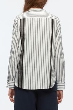 White Signature Stripes Shirt For Work, White Tops With Signature Stripes For Workwear, White Vertical Stripes Blouse For Workwear, White Blouse With Vertical Stripes For Work, Chic White Shirt With Vertical Stripes, Pinstripe Shirt With Contrast Stripes For Work, White Vertical Striped Tops For Office, Organza Overlay, Banded Collar Shirts