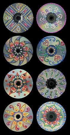 six different colored discs with designs on them