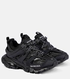 Track sneakers in black - Balenciaga | Mytheresa Balenciaga Track Black, Tenis Balenciaga, Balenciaga Track Sneaker, Balenciaga Track Sneakers, Balenciaga Shoes Sneakers, Track Sneakers, Pretty Sneakers, Rubber Sneakers, Black Balenciaga