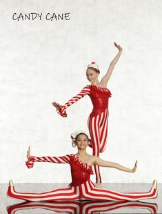 two young women in red and white striped outfits are doing splits on the dance floor