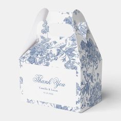 Enchant your guests with a touch of Parisian charm and a delightful treat nestled inside this elegant French vintage blue floral Jouy favor box.

Enchanting Elegance:

Rich Blue: The box boasts a luxurious blue hue, evoking a sense of sophistication and timeless style.
French Jouy Charm: Delicate florals and whimsical motifs in a classic Jouy design adorn the box, adding a touch of whimsical elegance.
High-Quality Material: Crafted from sturdy yet beautiful cardboard or paperboard, it ensures yo Blue Blush Wedding Theme, Vintage Box Design, Wedding Goodie Bags For Guests, Wedding Guest Gifts Party Favors, French Style Wedding, Luxury Box Design, Wedding Guest Gifts, Gift For Guests, Wedding Gifts For Guests