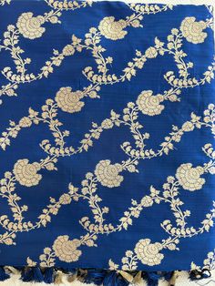 **SILK MARK CERTIFIED** **Gorgeous pure Banarasi Katan Silk Saree with blouse piece (unstitched) in blue and gold** **100% silk and high quality** **Direct from Banaras** Material: 100% Katan Silk Blouse piece: Included (Unstitched) Fall and Pico: YES Color: Blue, Gold Occasion: Festivals, Weddings, Cultural Events, Puja, Parties, Formal Gatherings, Family Functions, Graduations Experience the charm of this Handwoven Blue Banarasi Meenakari Katan Silk Saree, a beautiful blend of art and traditio Saree Green, Saree Blue, Banarasi Katan Silk Saree, Katan Silk Saree, Saree Silk, Pure Silk Saree, Katan Silk, Silk Saree With Blouse, Banarasi Saree