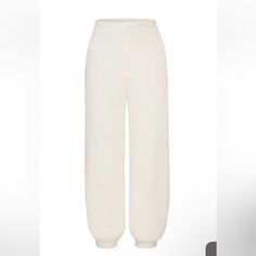 Plush And Decadently Soft, These Easy-Fitting Joggers That Make All Your Dreams Sweeter Are From Kim Kardashian West's Highly Sought-Out Skims. Elastic Waist Elastic Cuffs 76% Polyester, 24% Nylon Hand Wash, Dry Flat Imported Nwt Cozy Winter Sweatpants, Cozy Pants With Ribbed Cuffs, Cozy Winter Loungewear Pants, Cozy Winter Bottoms With Ribbed Cuffs, Cozy Winter Loungewear Bottoms, Super Soft Winter Loungewear Bottoms, Winter Loungewear Snug Bottoms, Cozy Soft Knit Winter Pants, Cozy Winter Pants With Ribbed Cuffs