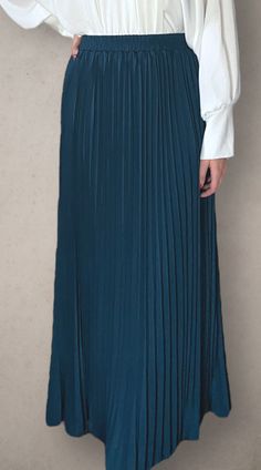 Modest high rise maxi skirt. Elastic waistband. Pleated. Fully lined for full coverage. Maxi Length Lined Skirt For Work, Spring Workwear Maxi Skirt Full Length, Spring Workwear Full Length Maxi Skirt, Elegant Blue Maxi Skirt With Elastic Waistband, Elegant Blue Skirt With Elastic Waistband, Spring Workwear Maxi Skirt, Flowy Maxi Skirt For Workwear, Spring Maxi Skirt With Pleated Waist, Full Length Pleated Skirt For Spring