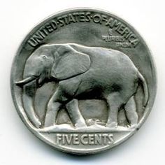 an elephant is depicted on the back of a coin