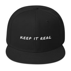 Introducing our sleek Keep It Real Snapback Hat - the perfect accessory for a trendy and laid-back style. This classic baseball cap comes with an adjustable snap closure, ensuring a comfortable fit for all head sizes. Its flat brim adds an urban edge, while the high-quality materials keep you cool and stylish in any setting. Key Characteristics:• 85% acrylic, 15% wool• Structured, 6-panel, high-profile• Plastic snap closure• Grey under visor• Head circumference: 22”–24” Classic Flat Cap Fitted Hat For Streetwear, Sporty Everyday Baseball Cap With Flat Bill, Streetwear Snapback Hat With Flat Bill, Hip Hop Snapback Hat With Flat Brim, Sporty Everyday Snapback Baseball Cap, Trendy Adjustable Snapback Fitted Hat, Trendy Streetwear Flat Cap, Sporty Snapback Hat For Streetwear With Flat Crown, Sporty Snapback Hat With Flat Crown For Streetwear