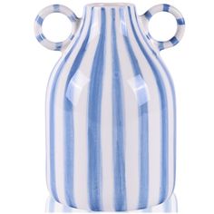 a blue and white striped vase with two handles