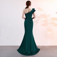 Pine Green One Shoulder Evening Gown Green One-shoulder Wedding Gown, Green Off-shoulder Maxi Dress For Banquets, Green Off-shoulder Maxi Dress For Banquet, Dark Green Floor-length Prom Gown, Dark Green Floor-length Evening Dress, Green Evening Gown With Asymmetrical Neckline, Green Fitted One Shoulder Wedding Dress, Green One-shoulder Evening Dress For Wedding, Green Fitted One-shoulder Wedding Dress