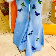 The Cutest Jeans Ever Are Here! Playful Butterflies Dance Up And Down Your Legs Features Raw Cut Hem And Can Be Easily Shortened. Jeans Are Custom. Butterfly Colors Vary. Coachella Festival Bellbottoms Spring Retro Boho Flares Highwaisted Butterfly Burning Man Condition: New Fabric: 32% Cotton, 49% Rayon, 17% Polyester, 2% Spandex Bell Size Is 16 Inches Laid Flat Inseam: Approx 32 Inches Model Is 5' 10" Made In America Blue Flare Jeans For Summer Festival, High Waist Blue Jeans For Festival, High Waist Bottoms For Spring Festival, Embellished Wide Leg Bottoms For Summer, Denim Pants For Summer Festivals, Embellished Wide Leg Summer Bottoms, Casual Embellished Summer Bottoms, Casual Embellished Bottoms For Summer, Fitted Flare Jeans For Spring Festival