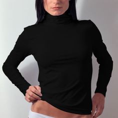 You can’t go wrong with this timeless classic. Our Long Sleeve Turtleneck Layering Top is comfortable, chic and always in style. Made from soft, comfortable Italian microfiber Breathable fabric keeps you comfortable all day Fabric won't wrinkle or catch on other clothing Gently hugs your curves without feeling restrictive Model is 5'4" and wears size 2 For more about Adea and our women's garments visit our FAQ page Turtleneck Layering, Plus Size Clothing Stores, Italian Lingerie, Comfortable Chic, Everyday Luxury, Layered Tops, Long Sleeve Turtleneck, Wardrobe Basics, Turtle Neck Top