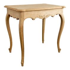 Vintage French Louis XV style bleached wood side table with carved apron and turned legs. Reminiscent of 19th C. Hand-crafted with beveled rounded top and thick aprons featuring carved foliate motif. Graceful scrolled cabriole legs feature escargot tips on the feet for a classically French touch.  Natural age wear. Sturdy. Bleached Wood Table, French Furniture Design, Bleached Wood, French Table, Wood Side Table, Work Project, Cabriole Legs, Style Table, Farmhouse Furniture