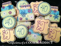 decorated cookies in the shape of flowers and numbers