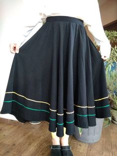 "Vintage black circle flared skirt decorated with yellow and green ric rac trim. Hook and eye on waist skirt. Flared black skirt. M size. Waist 30\"76cm Length 28,5\"72,5cm." Retro Black A-line Skirt, Retro Black Long Skirt, Black Retro A-line Skirt, Black A-line Retro Skirt, Retro Black Lined Skirt, Vintage Black Flared Skirt, God Character, Black Circle Skirt, Skirt With Lace Trim