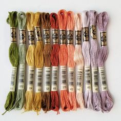 six skeins of different colors of yarn