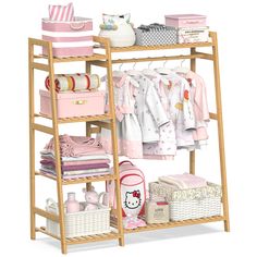 a wooden shelf filled with lots of baby items